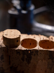 Traditional way of making cork stoppers for wine bottles from cork oak tree