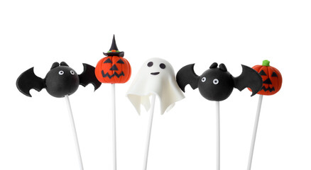 Different Halloween themed cake pops on white background