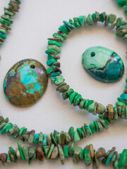 Natural turquoise in different sizes on a white background
