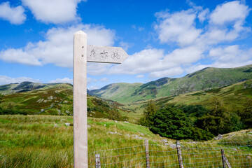 wooden public bridleway sign post in The Lake District
