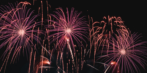 real colorful fireworks in the night sky, colorful fireworks on black background