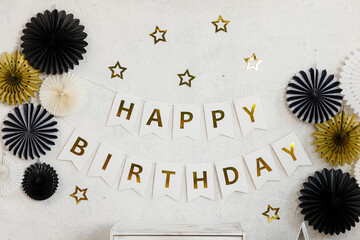 Birthday decorations - gifts, toys, balloons, garland and figure for little baby party on a white...