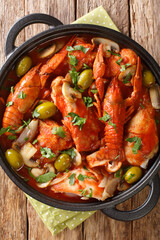 Marengo chicken casserole with a difference and whip up this version with mushrooms, olives, tomato and parsley in the pan. Vertical top view