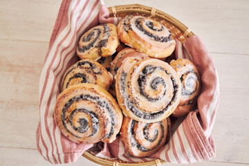 Closeup shot of poppy seed rolls with sugar glaze