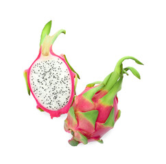 Delicious cut and whole dragon fruits (pitahaya) on white background, top view