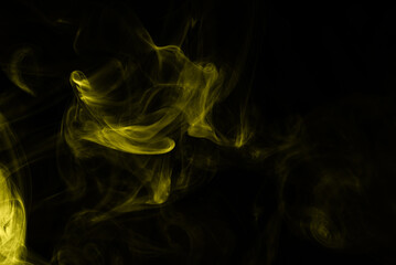 Yellow steam on a black background.