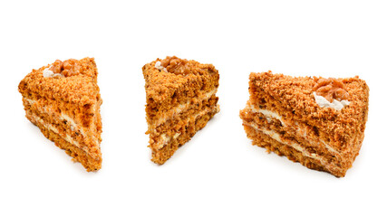 Peace of honey cake isolated on white background.
