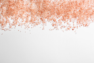 Pink himalayan salt isolated on white, top view