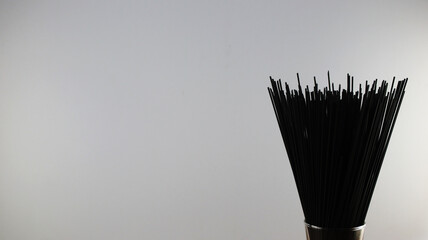 Black Spaghetti on white background