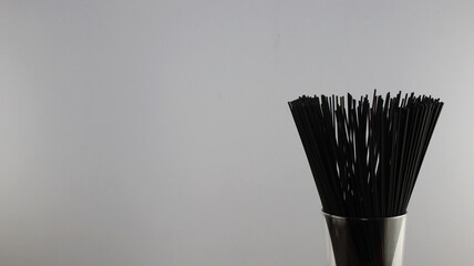 Black Spaghetti on white background
