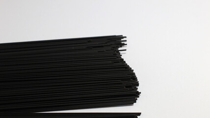 Black Spaghetti on white background