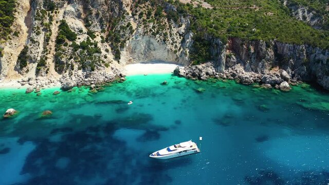 Aerial drone video of beautiful paradise bay of Afales and white beach in beautiful Ionian island of Ithaki or Ithaca, Greece