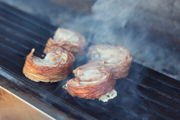 Turkish Street Food Kokorec rolls made with lamb bowel roasting in wood fired oven.