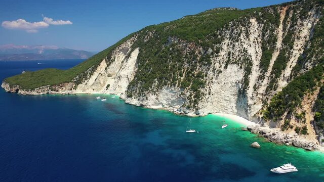 Aerial drone video of beautiful paradise bay of Afales and white beach in beautiful Ionian island of Ithaki or Ithaca, Greece