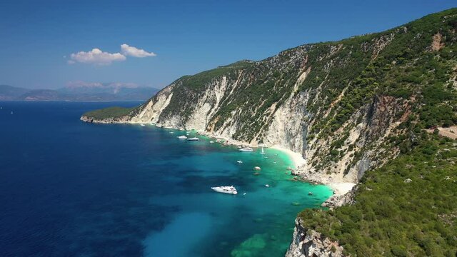 Aerial drone video of beautiful paradise bay of Afales and white beach in beautiful Ionian island of Ithaki or Ithaca, Greece
