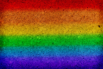 Concrete wall background with rainbow