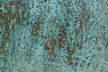 Old metallic surface with rust and cracked paint. Abstract background.
