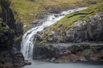 small waterfall in the mountains