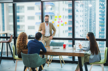 The corporate of worker officer discussion and sharing the project idea with leader manager