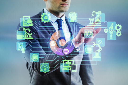 Businessman pressing buttons in RPA concept