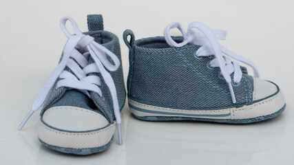 Blue children's sneakers with laces