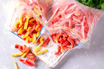 Frozen peppers in a plastic bag. Frozen vegetables. Concept of healthy eating.