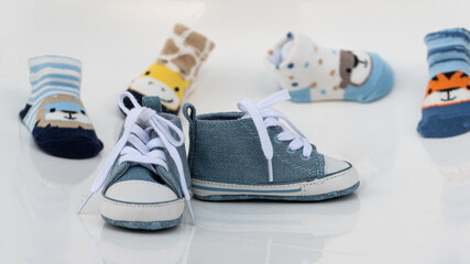 Fototapeta na wymiar Blue children's sneakers with laces.