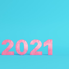 Pink 2021 digits on bright blue background in pastel colors