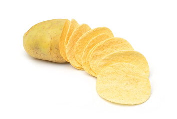 Crispy potato chips snack flat cut with fresh potato cut in half isolated on white background.