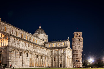Fototapeta na wymiar Pisa Cathedral and the Leaning Tower by night, Tuscany, Italy