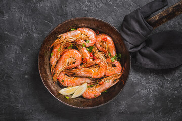 Wild red shrimps on dark background copy space.	