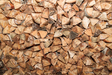 Pinned birch wood are in a pile in drevenice