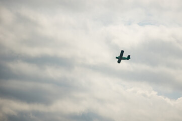 An-2 plane flies through the sky