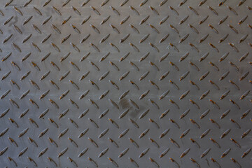 Silver and blue painted metallic plate anti slip surface. Metal diamond plate texture.