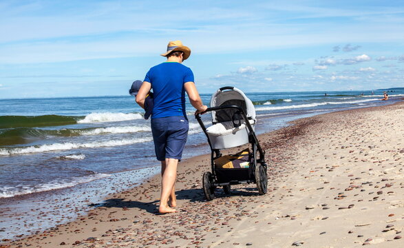 Father and son on the beach