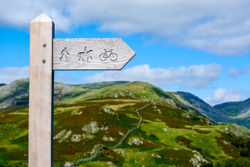 wooden public bridleway sign post in The Lake District