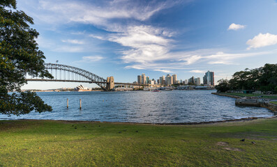 Naklejka premium Panoramic view of Sydney harbor bridge with Sydney downtown skyline, in the afternoon, New South Wales, Australia
