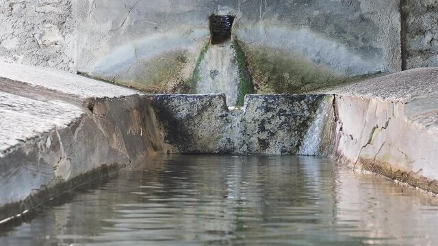 Old washhouse in the Italian village of Palanzo