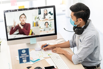Fototapeta na wymiar Asian businessman work from home involved video conference meeting.