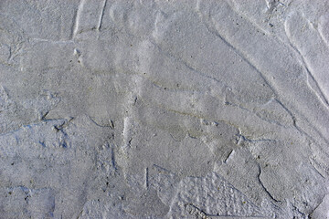 A beautiful backdrop of the gray fresh surface of concrete