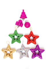 Christmas tree made from glitter ornaments isolated on white background.