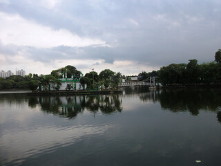 Mosque on the opposite side of the lake at Dhakuria Lake, Kolkata, India. 