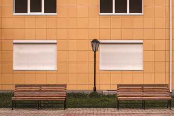 two benches by the building