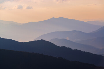 Mountains silhouettes at sunset