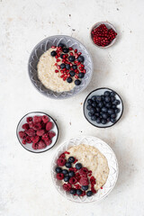 Oatmeal Porridge with berries and pomegranate.Healthy Breakfast