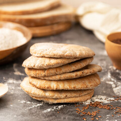 Pitta breads close up. Freshly baked wholegrain flat bread.