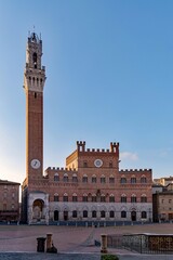Obraz premium The Palazzo Pubblico at the Piazza del Campo in Siena, Tuscany, Italy 