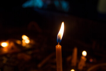 Candles burning in church
