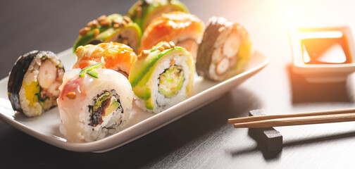 Traditional sushi roll set on plate