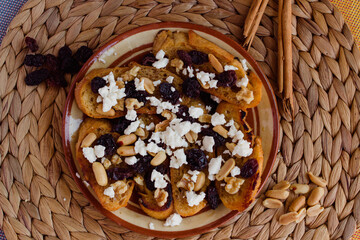 Capirotada flatlay view on a rustic background